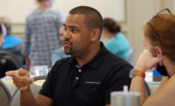 educators talking at a table